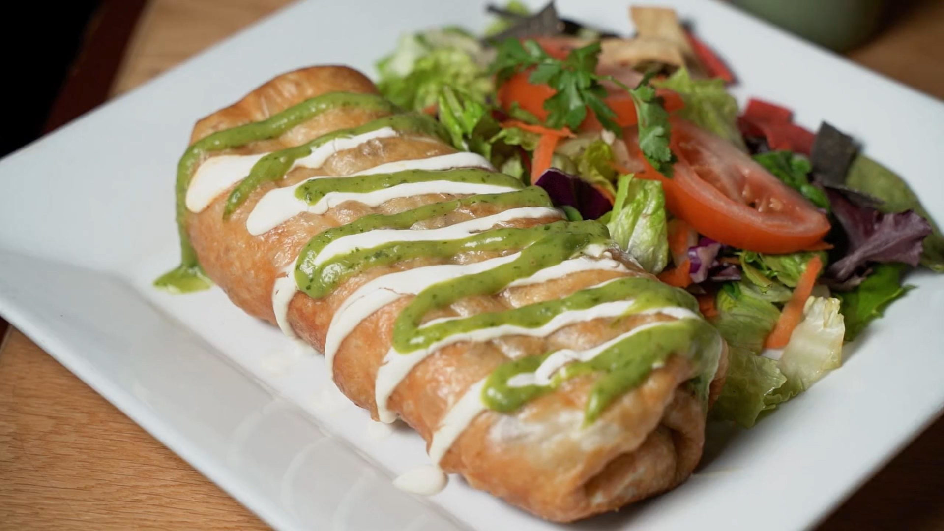 Angelou's burrito with salsa verde and crema